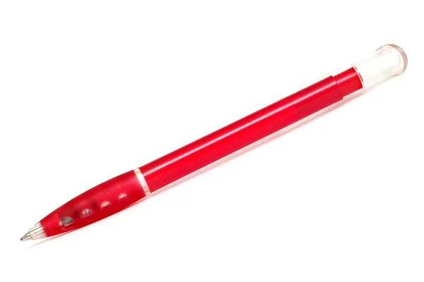 Красная пластиковая ручка — стоковое фото