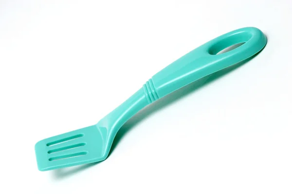 Green plastic shovel — Stock Photo, Image