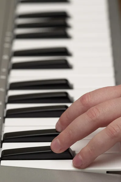 stock image Child fingers on piano