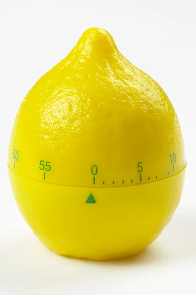Таймер с лимоном — стоковое фото