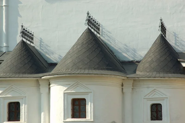 stock image Small windows of the big monastery