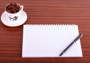 Pen,notebook and coffee clipart