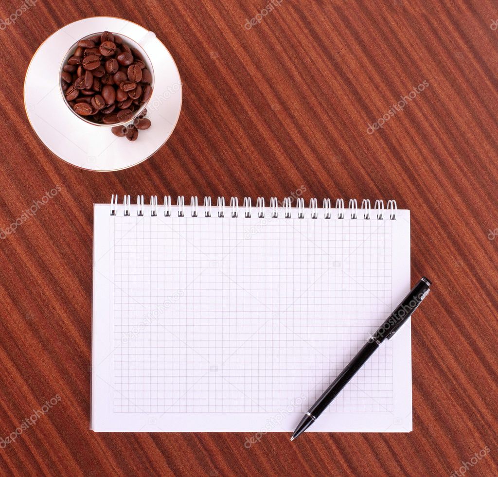 Pen,notebook and coffee