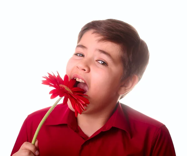 Tonåring och röd blomma — Stockfoto