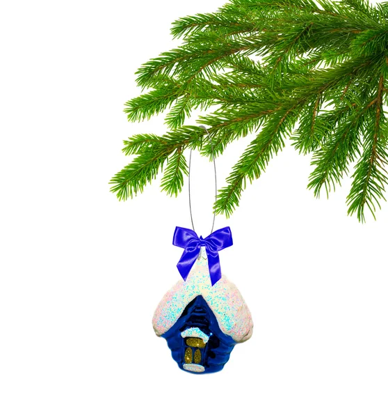 Christmas toy house on tree — Stock Photo, Image