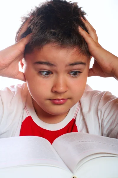 Stock image Child reading the book