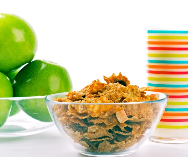 Cornflakes, glass of milk and green appl — Stock Photo, Image