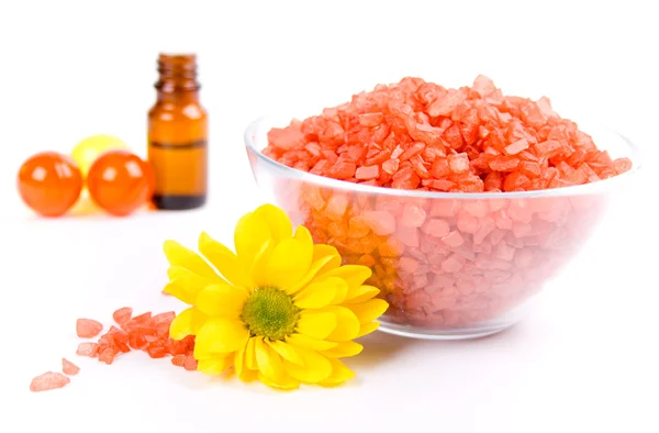 Bath salt, oil balls in a bowl and flowe — Stock Photo, Image