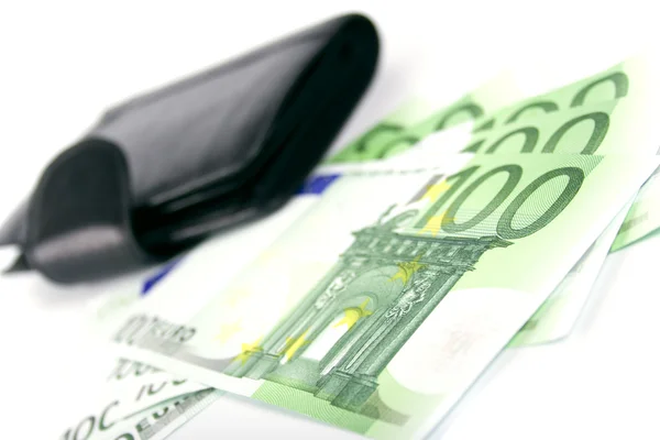 Euro e uma bolsa de couro — Fotografia de Stock