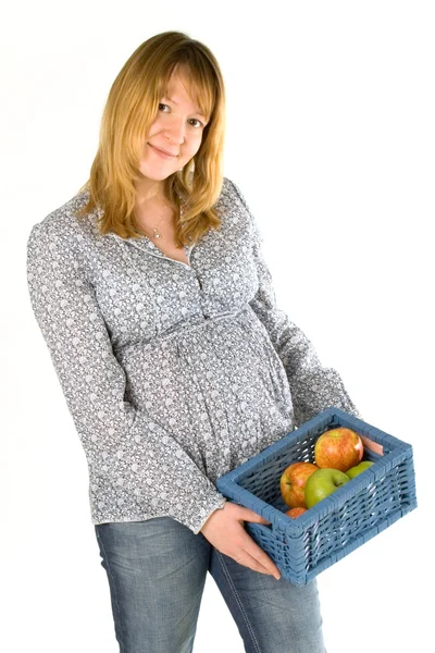 Mujer embarazada con manzanas — Foto de Stock
