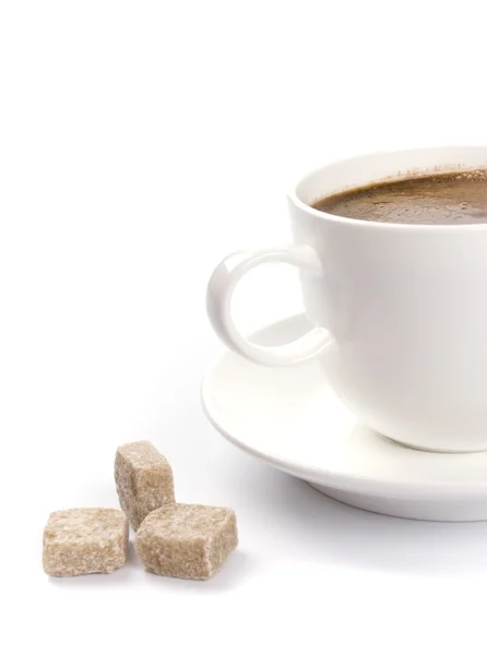 Kaffekopp och socker Stockbild