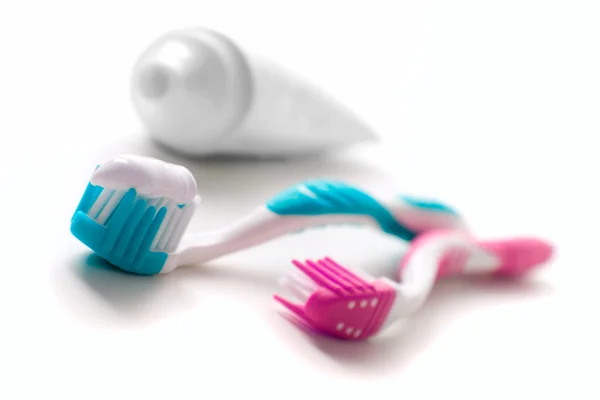 Toothpaste and toothbrushes Royalty Free Stock Photos