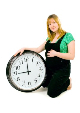 Pregnant woman with a clock clipart