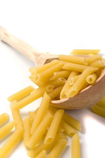 Macaroni in wooden spoon — Stock Photo, Image