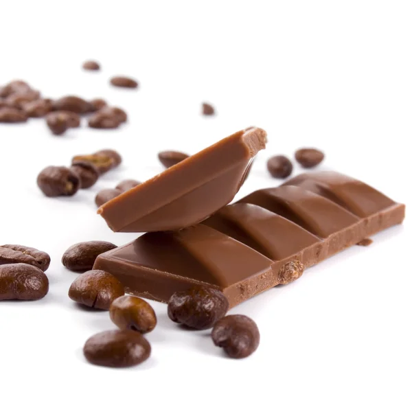 Čokolády a kávy lusky — Stock fotografie