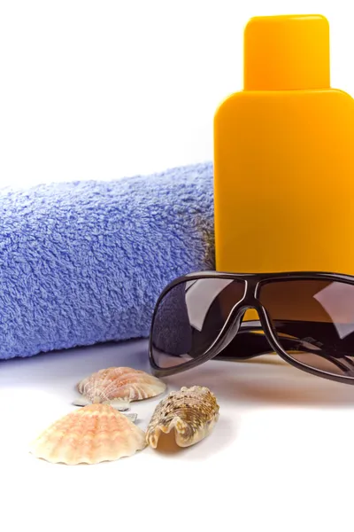 stock image Towel, sunglasses and lotion