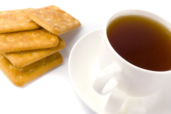 Cup of tea, sugar and cookies — Stock Photo, Image