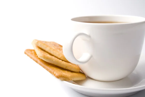 Tasse Tee und ein paar Kekse — Stockfoto