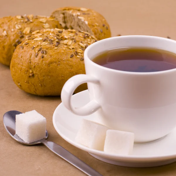 Šálek čaje, cukru a chleba — Stock fotografie