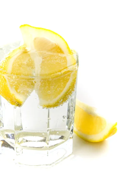 Soda water and lemon slices — Stock Photo, Image