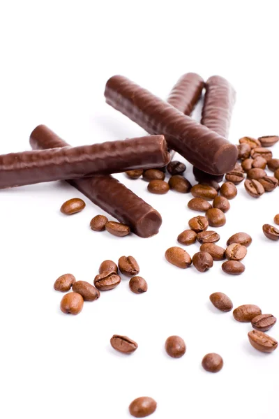 Chocolate bars and coffee beans — Stock Photo, Image