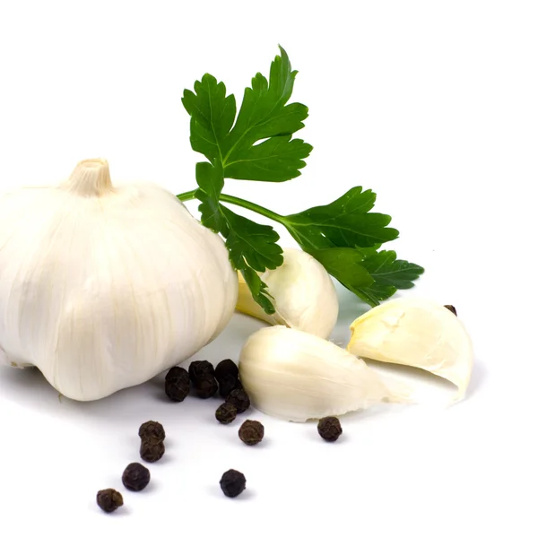 Garlics com pimenta preta e pars verde — Fotografia de Stock