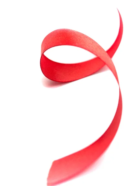 Красная атласная лента — стоковое фото