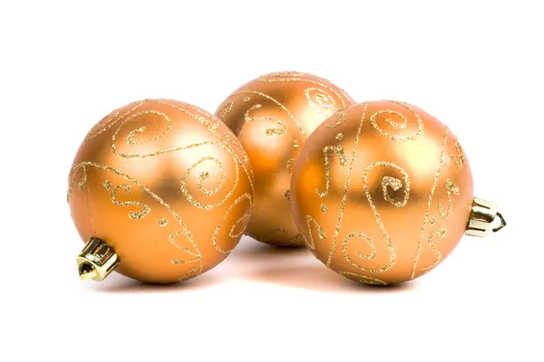 Trois boules de Noël dorées — Photo