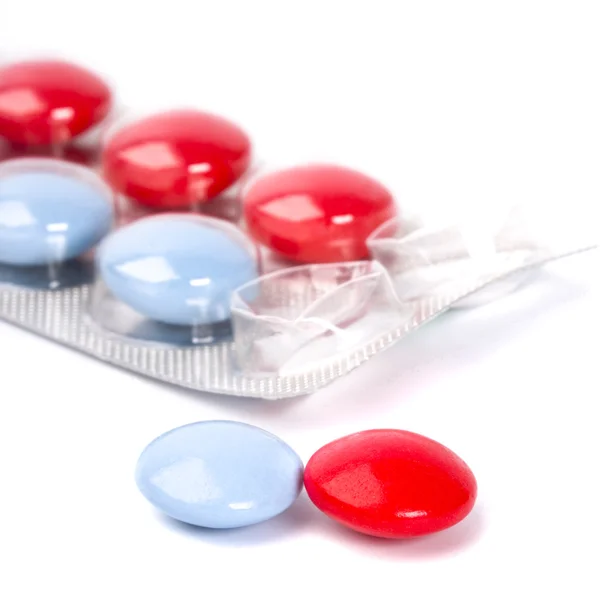 Czerwone i niebieskie tabletki — Zdjęcie stockowe