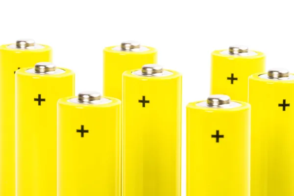 Osiem żółty baterie alkaliczne — Zdjęcie stockowe