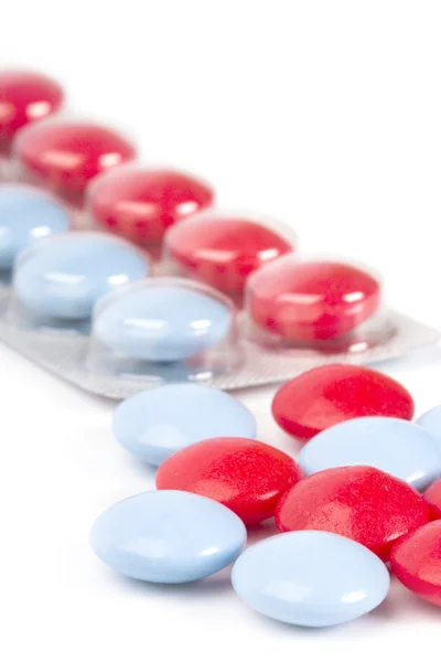 Röda och blå piller — Stockfoto