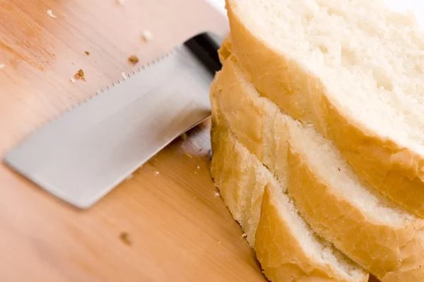 Baguette and knife — Stock Photo, Image
