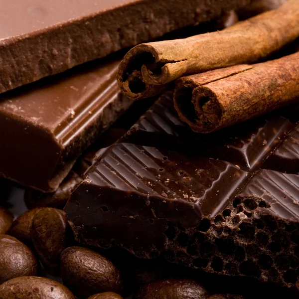 Chocolate, coffee and cinnamon sticks — Stock Photo, Image