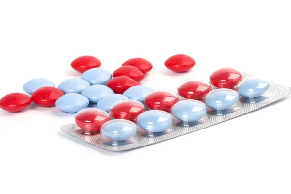 Rote und blaue Pillen — Stockfoto