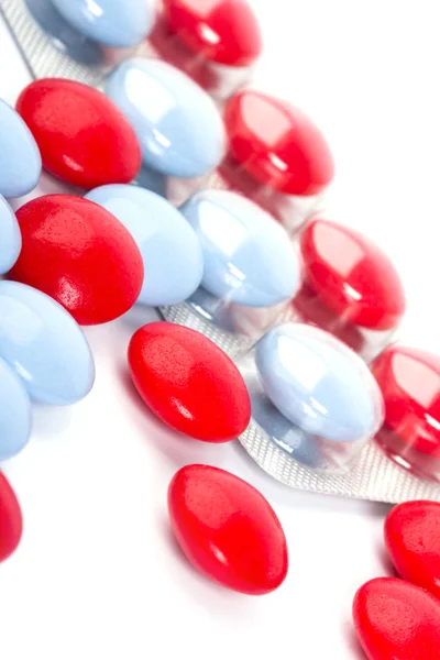 Červené a modré pilulky — Stock fotografie