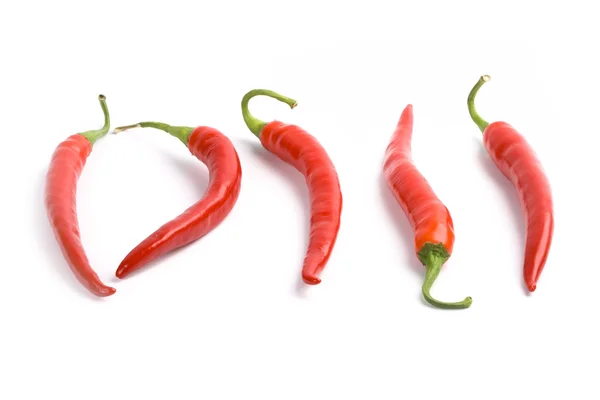 Vijf rode kille paprika 's — Stockfoto