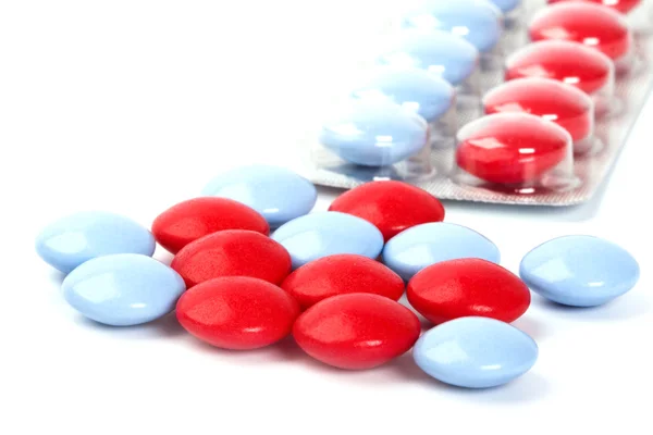 Červené a modré pilulky — Stock fotografie