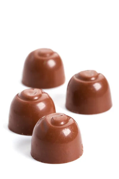 Four chocolate sweets — Zdjęcie stockowe