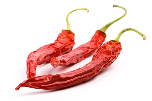 Drei trockene rote Chilischoten — Stockfoto