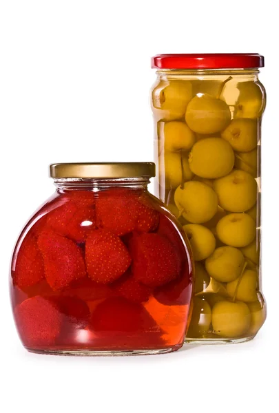 Jars of marinaded fruits, isolated — Stock Photo, Image