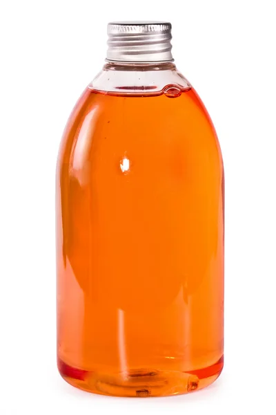 Capacidade com um líquido em um branco — Fotografia de Stock