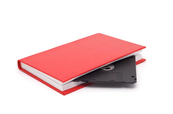 Het betaalbare fotoboek met een diskette. — Stockfoto