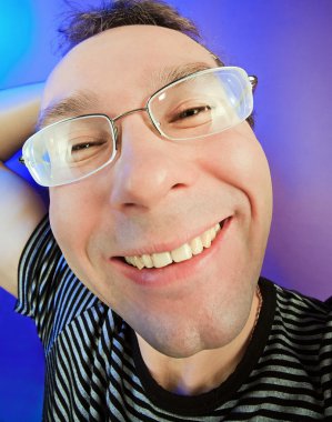 Funny happy man in glasses portrait clipart