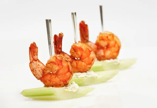 Tiger shrimp canape with celery isolated — Stock Photo, Image
