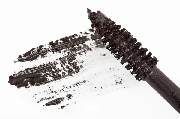 Pinselstrich schwarzer Mascara auf weißem Hintergrund — Stockfoto