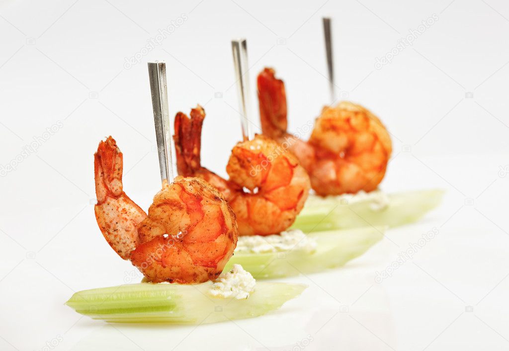 Tiger shrimp canape with celery isolated