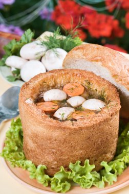 Mushroom soup in bread bowl clipart