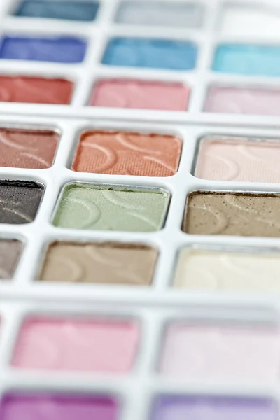 Multicolored eyeshadow palette on white — Stock Photo, Image