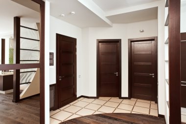 Modern hall interior with many doors clipart