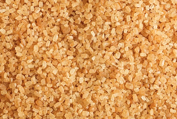 Açúcar de cana de grãos grosseiros — Fotografia de Stock